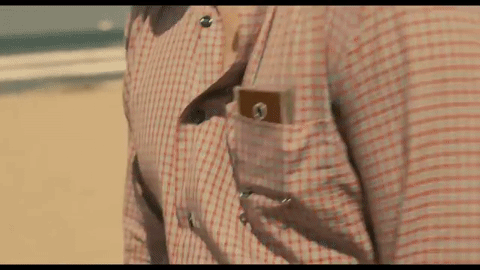 Wearable, super intelligent AI earpiece in the movie “*Her”*